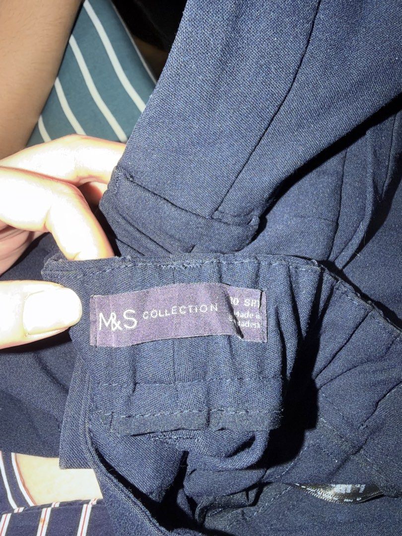 M&S Collection Navy Blue Trousers Size 10 Short (Category: Trousers) located in Manila. Submitted by garagesalebykoda (Listing ID 1469512896, Image 2). Description: - Brand: M&S Collection - Color: Navy Blue - Size: 10 Short - Fit: Elasticated waistband at the back for extra comfort - Cut: Straight leg, great for work or casual wear - Origin: Made in Bangladesh - Condition: Excellent / Ready to wear - Feel free to send a message for inquiries!.