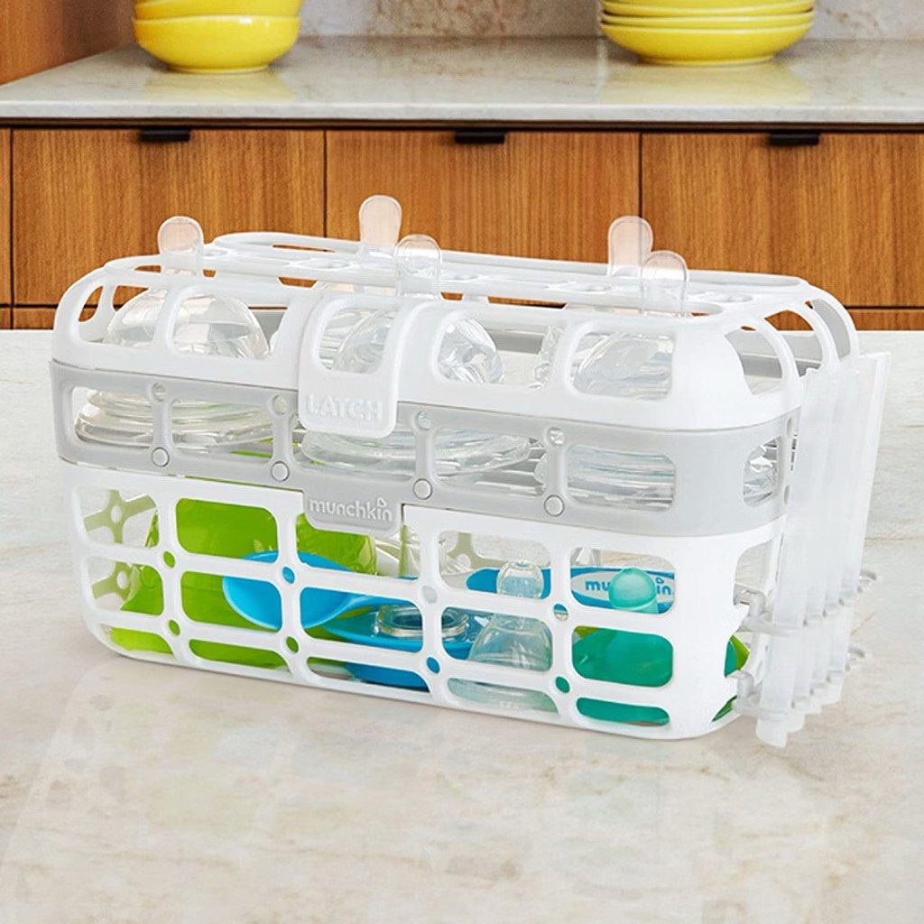 Munchkin Dishwasher Basket (Category: Breastfeeding & Bottle Feeding) located in Muntinlupa City. Submitted by thriftpandamnl (Listing ID 1469459657, Image 3). Description: Selling our Munchkin Dishwasher Basket✨ 🏷️P500 for 2pcs ❗️useful kung may dishwasher ka at isasabay mo yung paghugas ng baby bottles sa dishwasher Product Features: ✔️Fits all bottle parts in one load, no more hand washing ✔️Adjustable compartments grow with your baby’s chang