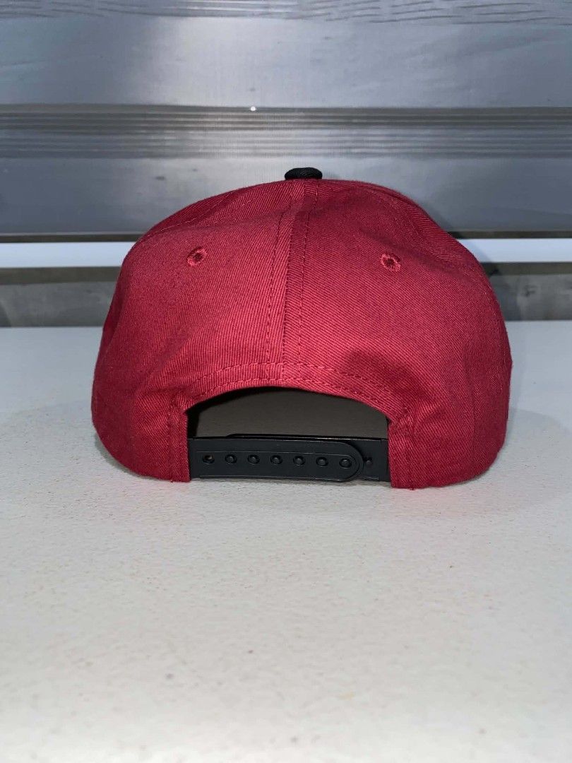 Naruto Shippuden Akatsuki Cloud Snapback Cap Red Black (Category: Caps & Hats) located in Baler. Submitted by mariokush193815 (Listing ID 1469453002, Image 3). Description: - Official Naruto Shippuden merchandise - Burgundy crown with contrasting black brim - Detailed red Akatsuki cloud embroidery on front - Adjustable snapback closure for a custom fit - Clean interior lining with finished seam taping - Condition: Excellent / Like new.