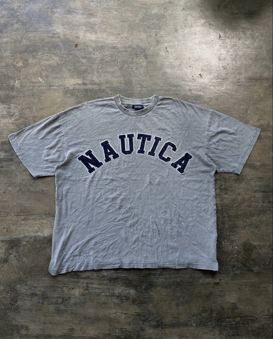 Nautica Arc Logo Tee (Category: Tshirts & Polo Shirts ) located in Kalibo. Submitted by notdavaaa (Listing ID 1469499020, Image 1). Description: Size: Large Dimes: W: 26.5 L: 29 Excellent condition, small pinhole (see last pic) Color Rate: 9.8/10.