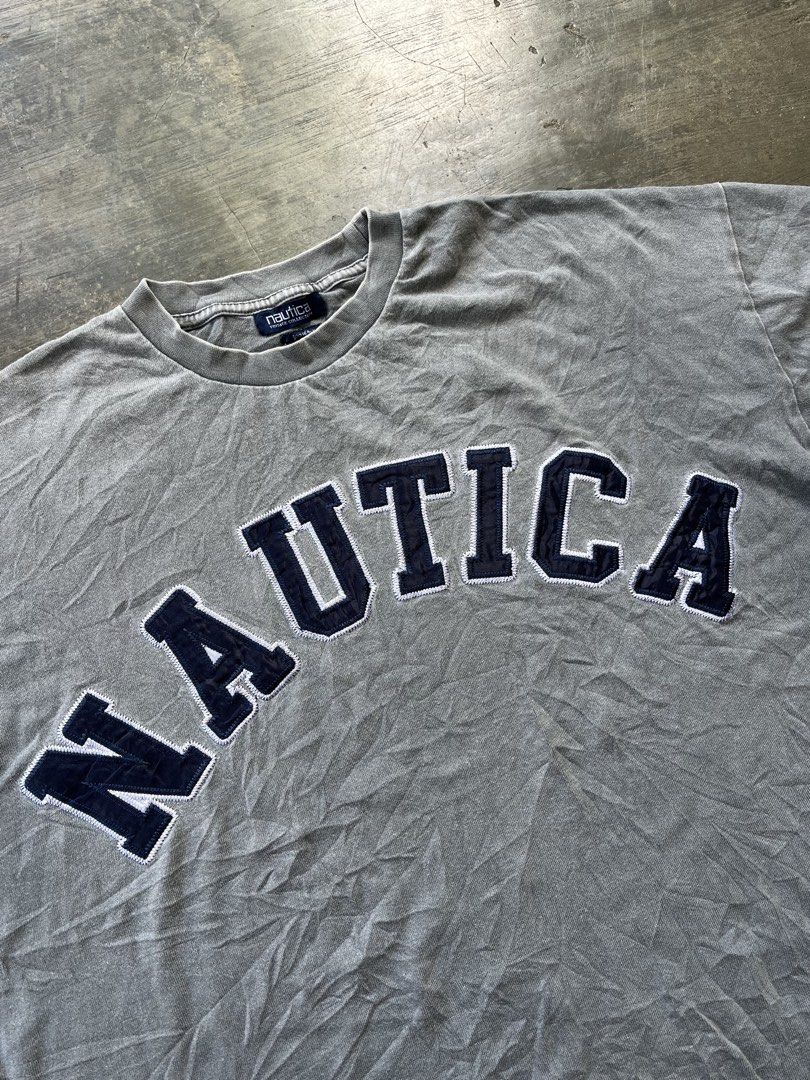 Nautica Arc Logo Tee (Category: Tshirts & Polo Shirts ) located in Kalibo. Submitted by notdavaaa (Listing ID 1469499020, Image 3). Description: Size: Large Dimes: W: 26.5 L: 29 Excellent condition, small pinhole (see last pic) Color Rate: 9.8/10.