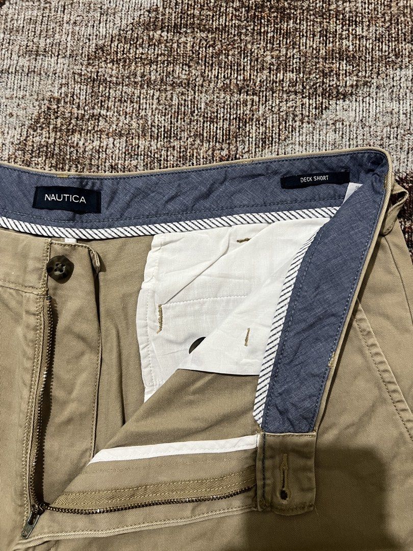 Nautica Deck Shorts (Category: Shorts) located in Rizal. Submitted by ithriftph_ (Listing ID 1469506695, Image 3). Description: Details 🔻 Nautica Deck Shorts Khaki Authentic Comeplete Tags Waistline: 36" Length: 21" Leg hole: 12" Color rate: 9/10 Condition: 9/10 No issue Price: 350 pesos Reminders: Color may vary due to lighting and your screen resolution. Note: Ready to wear (already washed) Mode of Payment: 📌 Gcash 📌 Maribank.