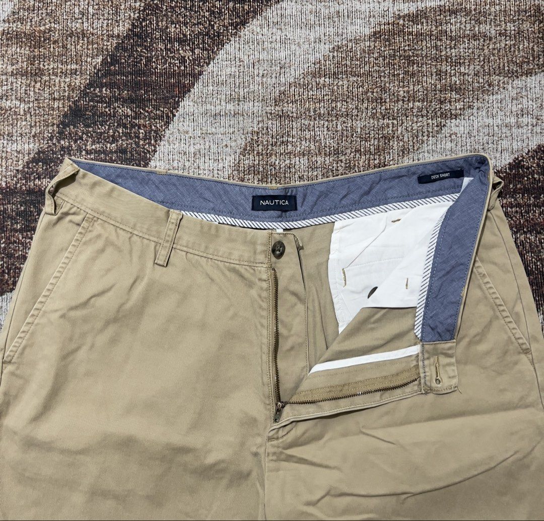 Nautica Deck Shorts (Category: Shorts) located in Rizal. Submitted by ithriftph_ (Listing ID 1469506695, Image 2). Description: Details 🔻 Nautica Deck Shorts Khaki Authentic Comeplete Tags Waistline: 36" Length: 21" Leg hole: 12" Color rate: 9/10 Condition: 9/10 No issue Price: 350 pesos Reminders: Color may vary due to lighting and your screen resolution. Note: Ready to wear (already washed) Mode of Payment: 📌 Gcash 📌 Maribank.