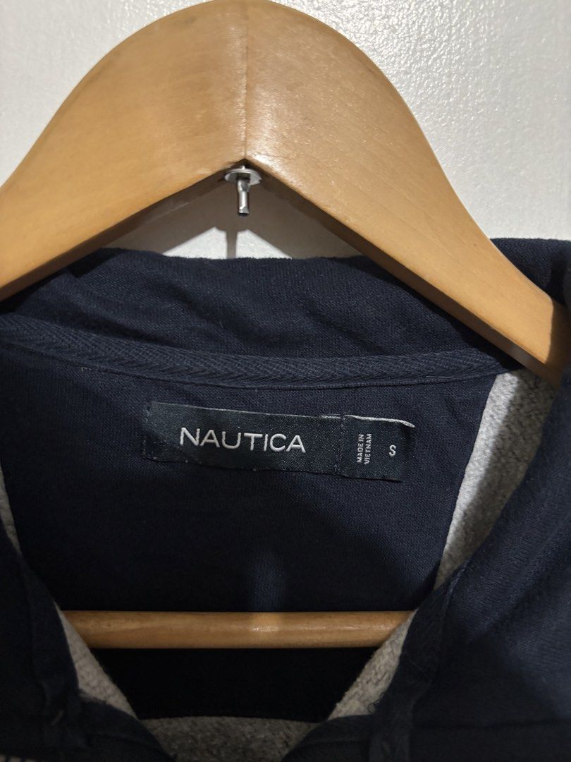Nautica Grey Half-Zip Sweatshirt Size S (Category: Coats, Jackets and Outerwear) located in Manila. Submitted by jemiruxd (Listing ID 1469510133, Image 2). Description: - Brand: Nautica - Color: Grey with navy blue collar and shoulder panels - Size: Small - Details: Small embroidered sailboat logo on chest, branded metallic zipper pull - Features: Ribbed cuffs and hem - Condition: Good, made in Vietnam.
