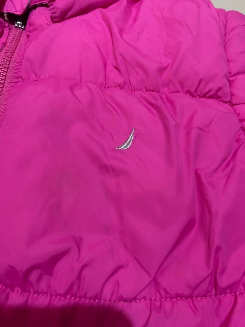 Nautica Reversible Puffer Jacket (Category: Coats, Jackets and Outerwear) located in Cainta. Submitted by ohhhhhhlori (Listing ID 1469526800, Image 2). Description: Nautica Reversible Puffer Jacket - Pink / Plaid Winter Coat Super cute 2-in-1 reversible winter jacket from Nautica! Switch easily between a vibrant solid magenta pink puffer side and a stylish grey/pink plaid windbreaker side. Features an attached hood and a high-quality reversible Y