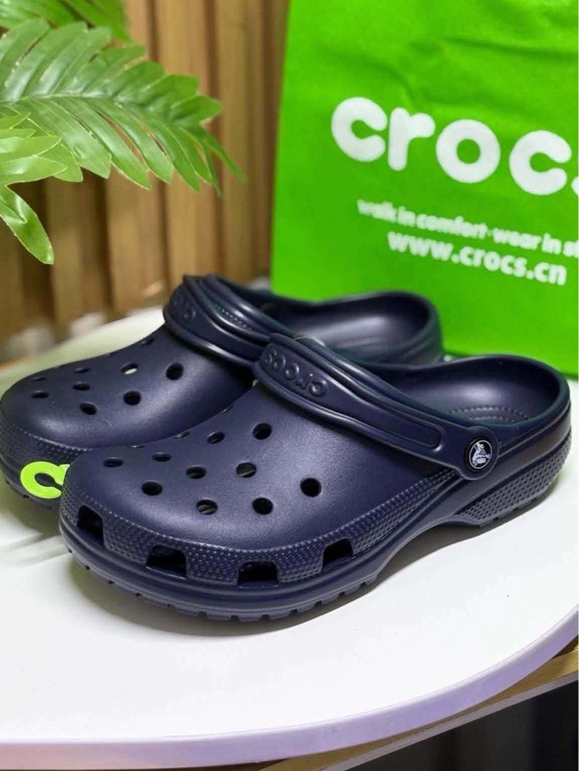 Navy Blue Classic Crocs (Category: Slippers and slides) located in Quezon City. Submitted by stuffs.hellyy (Listing ID 1469560069, Image 1). Description: W8 & W9 avail sizes made in vietnam.