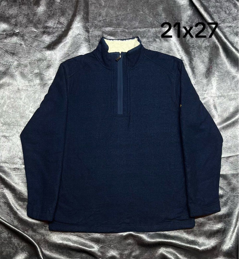 Navy Blue Quarter Zip Fleece Pullover Sweater (Category: Coats, Jackets and Outerwear) located in Cavite. Submitted by bellewii (Listing ID 1469527058, Image 1). Description: Dark navy blue quarter zip pullover. Soft fleece lining inside the collar. Textured outer fabric. Measurements are 21 inches pit to pit and 27 inches length, noted in the photo. Easy to throw on for cooler days..