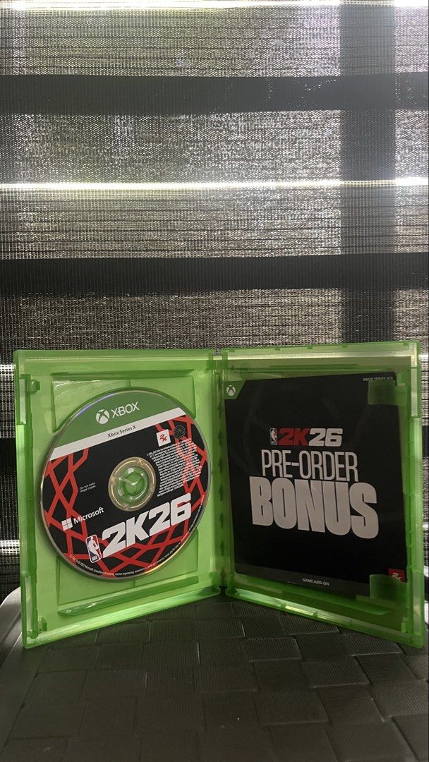 NBA 2K26 Xbox Series X Xbox One (Category: Xbox) located in Lapu Lapu. Submitted by vincentl. (Listing ID 1469543878, Image 2). Description: - Game: NBA 2K26 (Xbox Series X & Xbox One) - Condition: Pristine, scratch-free disc that works perfectly - Inclusion: Original green case and unused pre-order bonus insert - Usage: Lightly used, finished the game mode and ready to pass on - Shipping or meet-up options available.