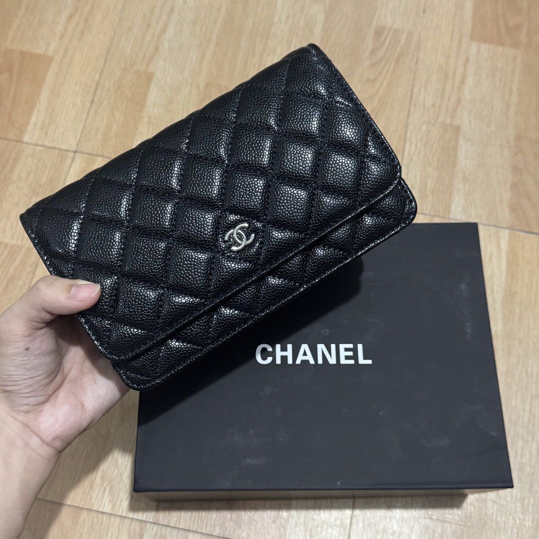 Chanel Wallet on Chain Silver Hardware (Category: Luxury Bags & Wallets) located in Manila. Submitted by reinjoseph (Listing ID 1469463683, Image 1). Description: - Brand: Chanel - Style: Wallet on Chain (WOC) - Material: Black Quilted Caviar Leather - Hardware: Silver-tone with iconic CC logo - Closure: Magnetic snap - Interior: Multiple card slots, zip compartments, and slip pocket - Inclusion: chain strap and black Chanel box and dust bag - Co