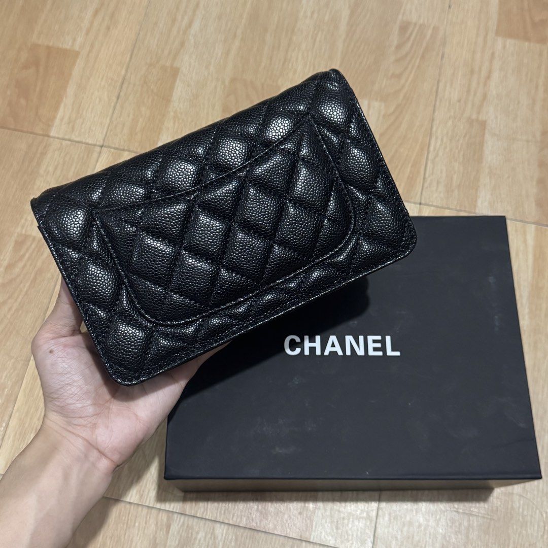 Chanel Wallet on Chain Silver Hardware (Category: Luxury Bags & Wallets) located in Manila. Submitted by reinjoseph (Listing ID 1469463683, Image 2). Description: - Brand: Chanel - Style: Wallet on Chain (WOC) - Material: Black Quilted Caviar Leather - Hardware: Silver-tone with iconic CC logo - Closure: Magnetic snap - Interior: Multiple card slots, zip compartments, and slip pocket - Inclusion: chain strap and black Chanel box and dust bag - Co