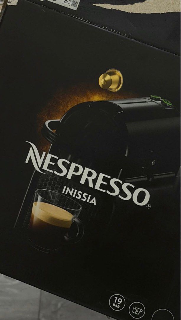 Nespresso Inissia Coffee Machine Black (Category: Coffee Machines & Makers) located in Manila. Submitted by siyagirl1206 (Listing ID 1469493305, Image 3). Description: - Model: Nespresso Inissia Coffee Machine (Black) - Condition: Works great, heats up fast, and is easy to clean - Performance: 19 bar high-pressure pump with simple buttons for espresso or lungo - Design: Compact size, ideal for small kitchen counters - Inclusions: Original packagi