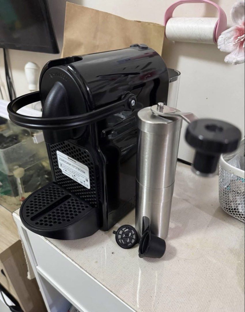 Nespresso Inissia Coffee Machine Black (Category: Coffee Machines & Makers) located in Manila. Submitted by siyagirl1206 (Listing ID 1469493305, Image 2). Description: - Model: Nespresso Inissia Coffee Machine (Black) - Condition: Works great, heats up fast, and is easy to clean - Performance: 19 bar high-pressure pump with simple buttons for espresso or lungo - Design: Compact size, ideal for small kitchen counters - Inclusions: Original packagi