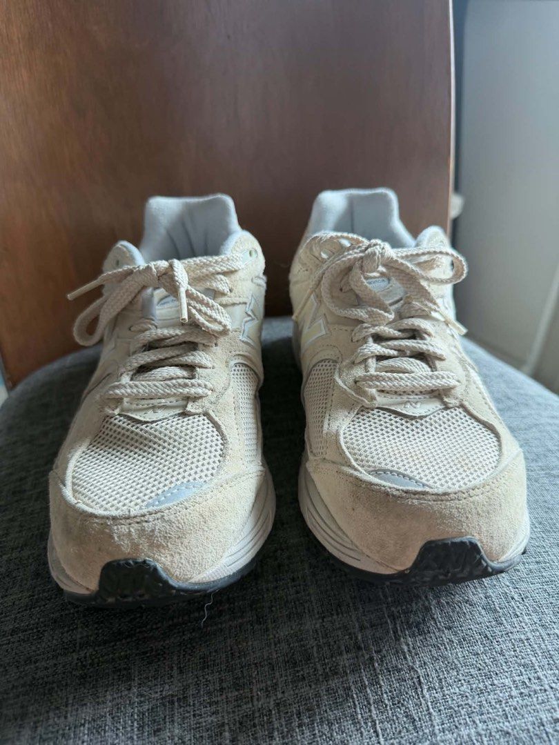 New Balance 2002RE Protection Pack Rain Cloud Beige (Category: Sneakers) located in Manila. Submitted by mialuna_ (Listing ID 1469425990, Image 2). Description: - Brand: New Balance 2002R - Color: Cream and beige - Size: US 8 Men / US 9.5 Women - Material: Suede and mesh upper panels - Features: Chunky sole unit, extremely comfortable - Condition: Pre-owned with visible wear on the toe and outsoles Unisex.