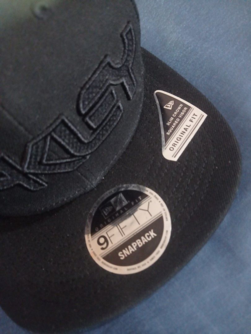 New Era Oakley 9FIFTY Snapback Cap Black B1B FB Hat (Category: Caps & Hats) located in Paranaque City. Submitted by annhua17524 (Listing ID 1469423834, Image 3). Description: - Brand: New Era 9FIFTY x Oakley - Color: Classic Black - Fit: Slim crown with squared visor and original fit - Condition: Brand new with original brim stickers and interior tags intact - US bought.