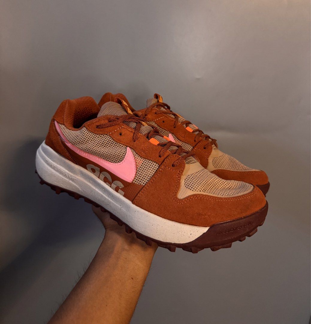Nike ACG Lowcate Brown Pink Sneakers (Category: Sneakers) located in Alaminos. Submitted by outfitcheck.ph (Listing ID 1469512944, Image 1). Description: - Brand/Model: Nike ACG Lowcate - Colorway: Brown and Pink with pink Swoosh - Materials: Breathable mesh and durable suede upper - Sole: Trailframe unit with a textured outsole for superior grip - Branding: ACG logo on heel and tongue - Condition: 9.5/10 condition, worn only a couple of times wi