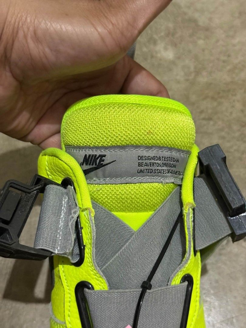 Nike Air Force 1 Utility Volt Black (Category: Sneakers) located in Manila. Submitted by amare_finds.ph (Listing ID 1469409192, Image 2). Description: - Model: Nike Air Force 1 Utility -US 8.5 men’s / Euro 42 / 26.5cm - Colorway: Neon Volt with black swoosh and classic white midsole - Material: Bright yellow tumbled leather - Features: Rugged utility strap system, heel pull tab, and exposed stitching details - Condition: Minor scuffing on the sid