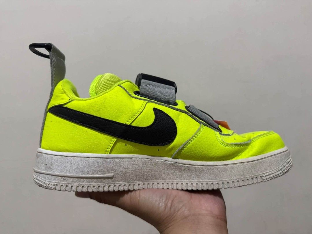 Nike Air Force 1 Utility Volt Black (Category: Sneakers) located in Manila. Submitted by amare_finds.ph (Listing ID 1469409192, Image 1). Description: - Model: Nike Air Force 1 Utility -US 8.5 men’s / Euro 42 / 26.5cm - Colorway: Neon Volt with black swoosh and classic white midsole - Material: Bright yellow tumbled leather - Features: Rugged utility strap system, heel pull tab, and exposed stitching details - Condition: Minor scuffing on the sid