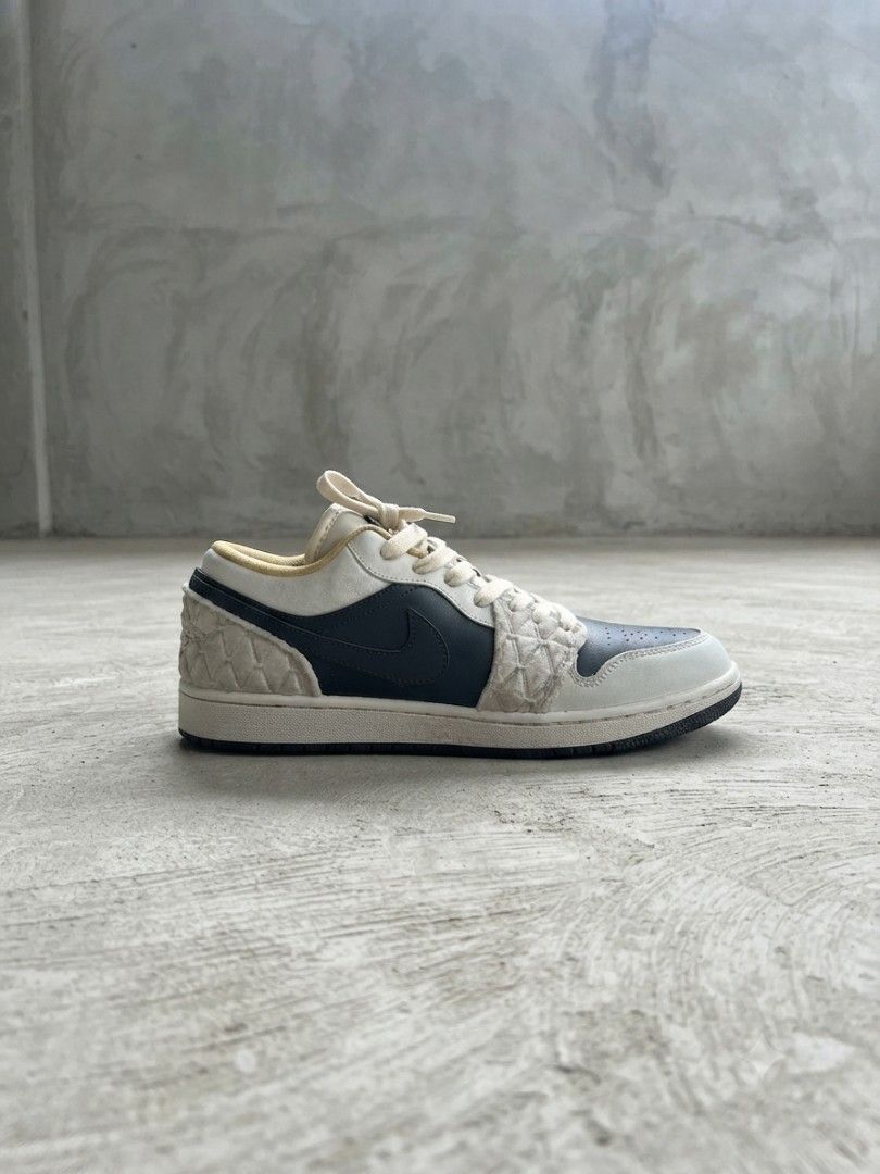 Nike Air Jordan 1 Low Quilted (Category: Sneakers) located in Manila. Submitted by realjude (Listing ID 1469435093, Image 3). Description: - Brand/Model: Nike Air Jordan 1 Low - Colorway: White and Dark Grey with matching cream laces and midsole - Design: Distinctive quilted side panels and overlays - Highlights: Sparkling crystal-embellished swoosh on the lateral side, smooth swoosh on the medial side - Condition: Clean overall condition with mi