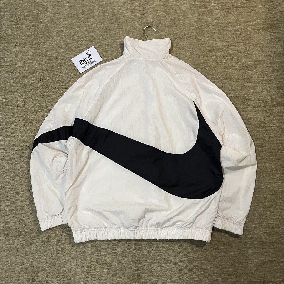 Nike Big Swoosh Windbreaker (Category: Coats, Jackets and Outerwear) located in Batangas. Submitted by reyr. (Listing ID 1469397736, Image 3). Description: Dimes: 24” width | 27.5” length Condition: Great Color rate: 9/10 Flaws: Unnoticeable stains.