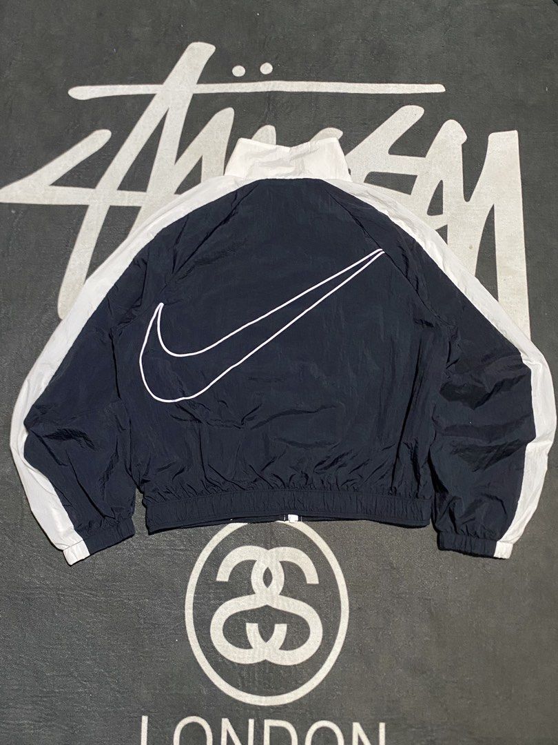 Nike big swoosh windbreaker (Category: Coats, Jackets and Outerwear) located in Andop. Submitted by trckmark4u (Listing ID 1469553476, Image 2). Description: Nike big swoosh Dimes21x24.5 Issue washable stain Ganda pa. Masyado Excellent condition .