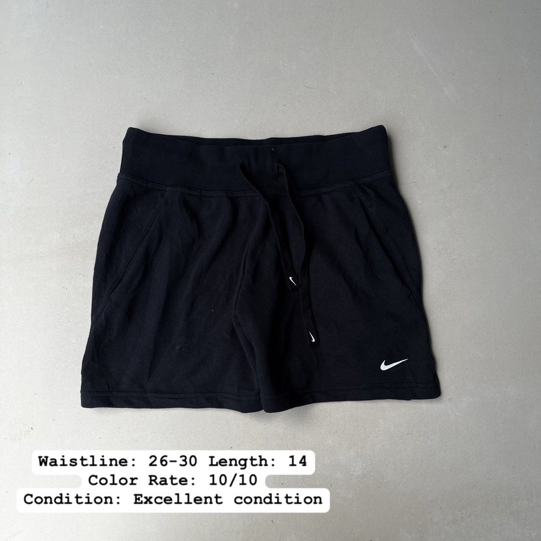Nike Black Athletic Shorts with Drawstring (Category: Shorts) located in Mandaue City. Submitted by chinsyap_03 (Listing ID 1469461465, Image 1). Description: - Brand: Nike - Color: Classic Black - Size: Medium (M) - Condition: Brand new / Excellent - Features: Comfortable wide waistband with adjustable drawstring - Pockets: Two convenient side pockets - Details: Iconic white embroidered Nike swoosh on the lower left leg - Versatile: Soft and bre