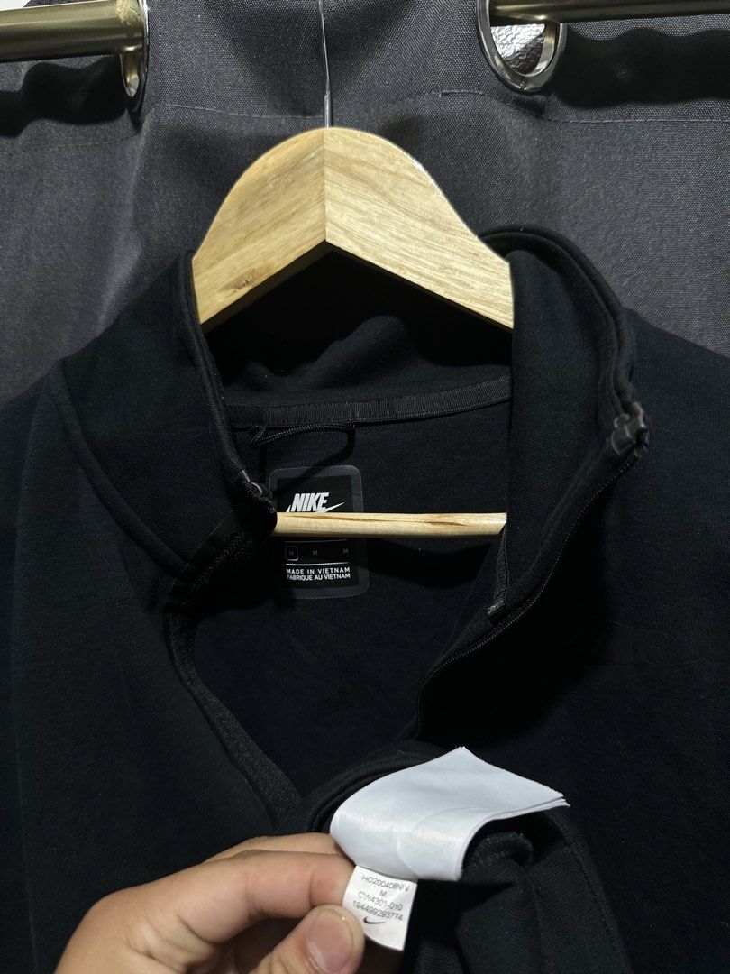 Nike Black Tech Fleece Zip Pullover Sweatshirt (Category: Coats, Jackets and Outerwear) located in Buenavista. Submitted by themodernrack_steals (Listing ID 1469417270, Image 3). Description: Note: The detail tags and detailed pics are in the photos, kindly check! Details & Features: Brand: Nike Color: All-Black / Triple Black Style: Half-Zip / High Collar Pullover Fleece with Taped Zipper Details & Tonal Chest Logo Size on Tag: Medium (M) Measur