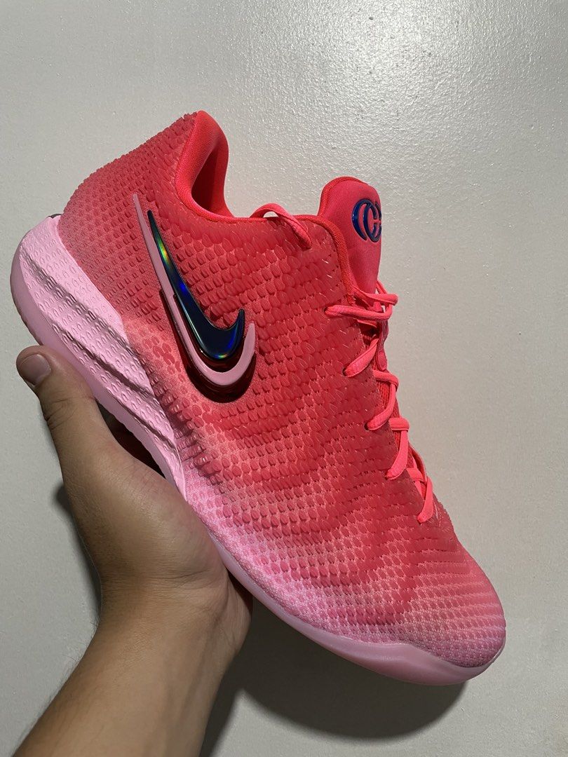 Nike Caitlin 1 Hot Punch (Category: Sneakers) located in Manila. Submitted by kaiiii1221 (Listing ID 1469546318, Image 1). Description: - Vibrant hot pink basketball shoes with a stylish dark-to-light gradient upper - Eye-catching iridescent metallic Swoosh on the sides - CC branding on the tongue and maroon signature plate on the heel - Bright pink laces paired with supportive mesh panels - Finished with a matching light pink midsole and outsole