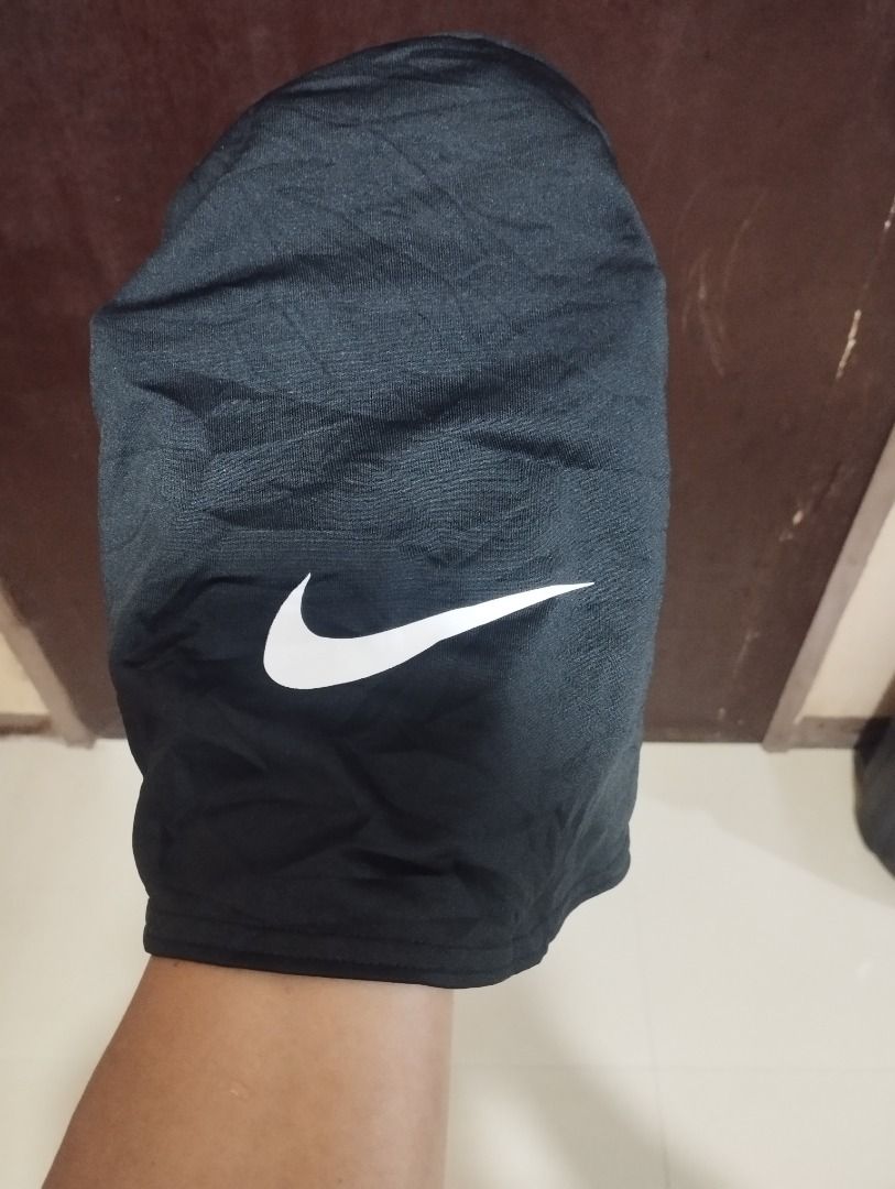 Nike Dri-FIT Neck Warmer Black One Size (Category: Scarves) located in Caloocan City. Submitted by jrdar (Listing ID 1469566496, Image 2). Description: - Brand: Nike - Style: Dri-FIT Neck Warmer / Snood - Color: Solid Black with white Nike swoosh logo - Size: One size fits most adults - Material: 91% polyester, 9% spandex - Features: Lightweight, sweat-wicking fabric ideal for cold weather workouts and runs - Condition: Clean inner tags attached.