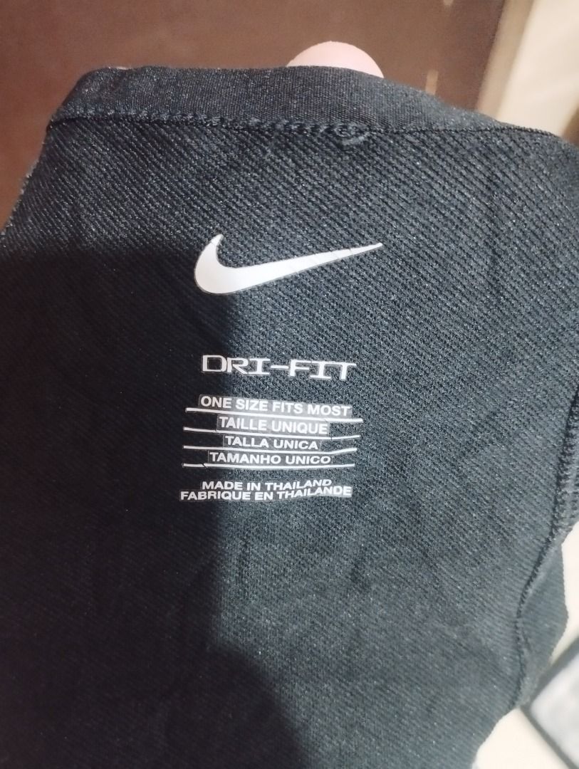 Nike Dri-FIT Neck Warmer Black One Size (Category: Scarves) located in Caloocan City. Submitted by jrdar (Listing ID 1469566496, Image 3). Description: - Brand: Nike - Style: Dri-FIT Neck Warmer / Snood - Color: Solid Black with white Nike swoosh logo - Size: One size fits most adults - Material: 91% polyester, 9% spandex - Features: Lightweight, sweat-wicking fabric ideal for cold weather workouts and runs - Condition: Clean inner tags attached.