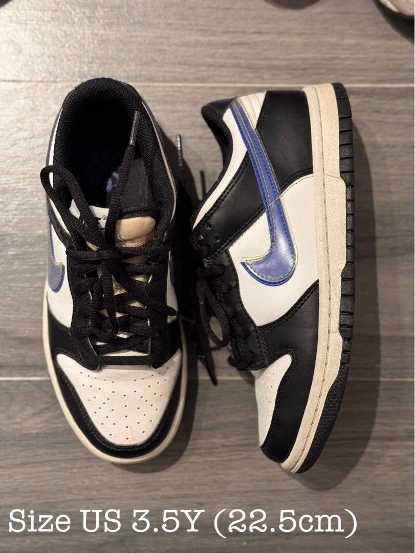 Nike Dunk Low Blue White Black Size US 3.5Y (Category: Babies & Kids Fashion) located in Santa Maria. Submitted by baghoarder23 (Listing ID 1469542655, Image 1). Description: - Brand: Nike - Model: Dunk Low - Colorway: Black, White, and Blue - Size: US 3.5Y (22.5cm) - Material: Classic leather upper with perforated toe box - Features: Matching black laces and rubber outsole - Condition: Good overall, minor midsole yellowing due to age and wear - 