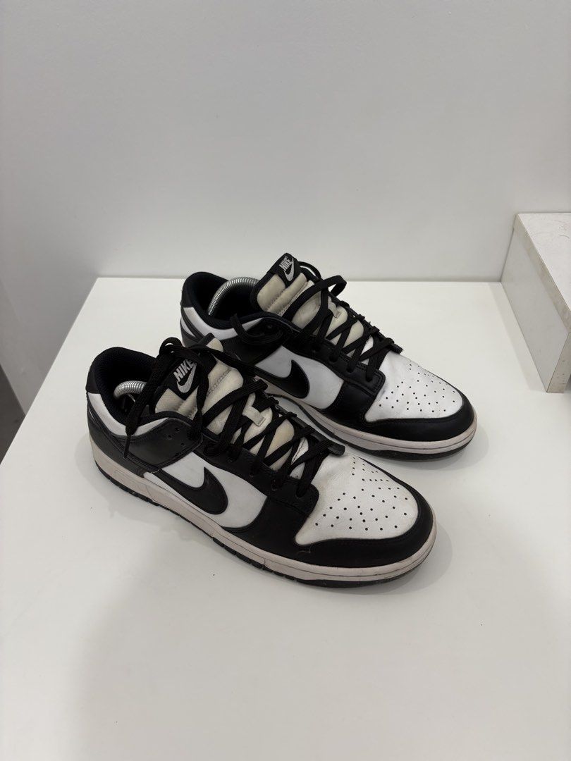 Nike Dunk Low Panda Black White (Category: Sneakers) located in Taytay. Submitted by kenniie (Listing ID 1469481452, Image 1). Description: - Item: Nike Dunk Low (Black & White / Panda) - Material: Leather upper with perforated toe box - size: Mens us:10.5 uk: 42.5 cm: 27.5 br: 40.5 - Condition: Worn, includes toe box creases and minor midsole scuffs - Soles: Plenty of life left for daily wear - Style: Classic streetwear essential.