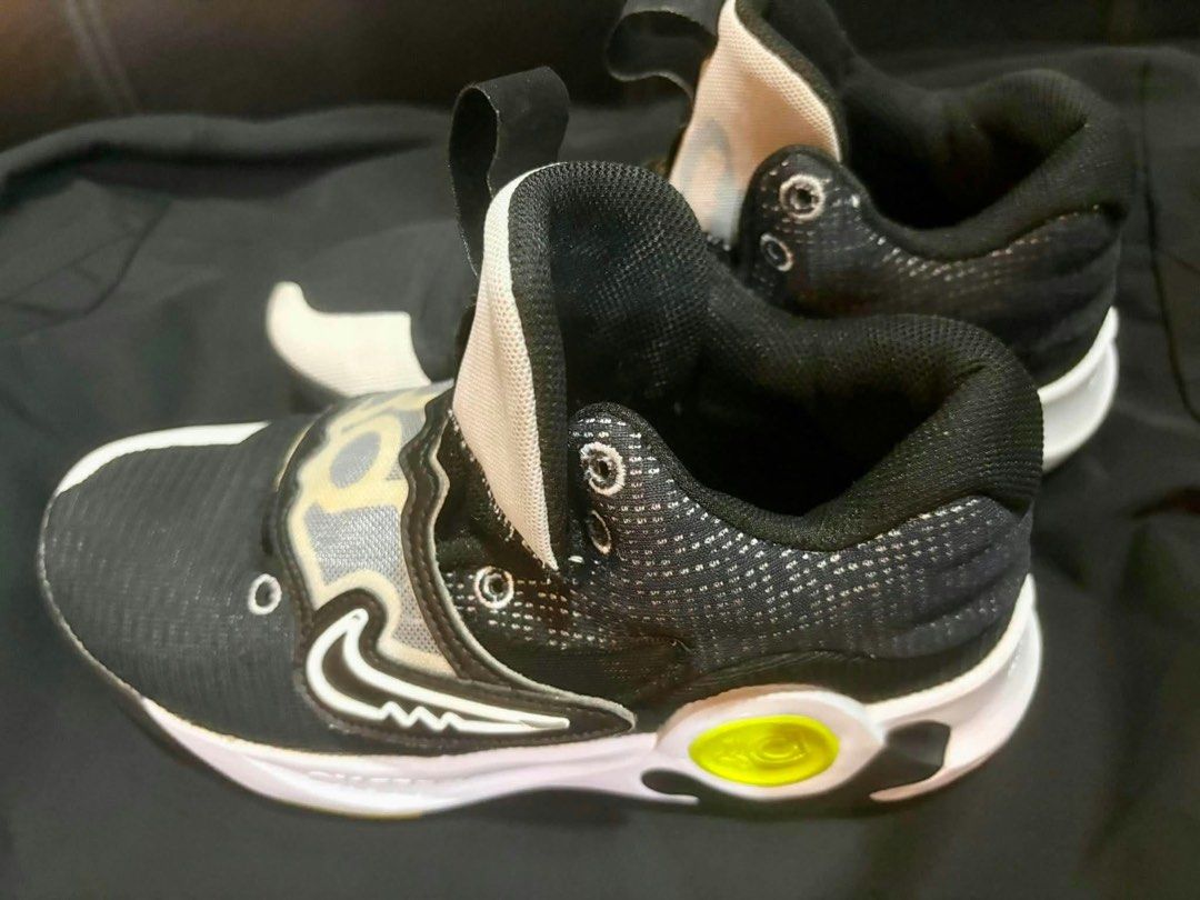 Nike KD Trey 5 x Black Volt [WITH BOX] (Category: Sneakers) located in Mandaluyong City. Submitted by copthatgirl (Listing ID 1469429597, Image 3). Description: WITH BOX - Colorway: Black and white with bright lime green accents - Lock-in Fit: Midfoot strap and cushioned collar for ultimate ankle support - Cushioning: Zoom Air midsole for impact protection - Traction: Wavy outsole pattern for solid court grip - Breathability: Mesh upper keeps fee