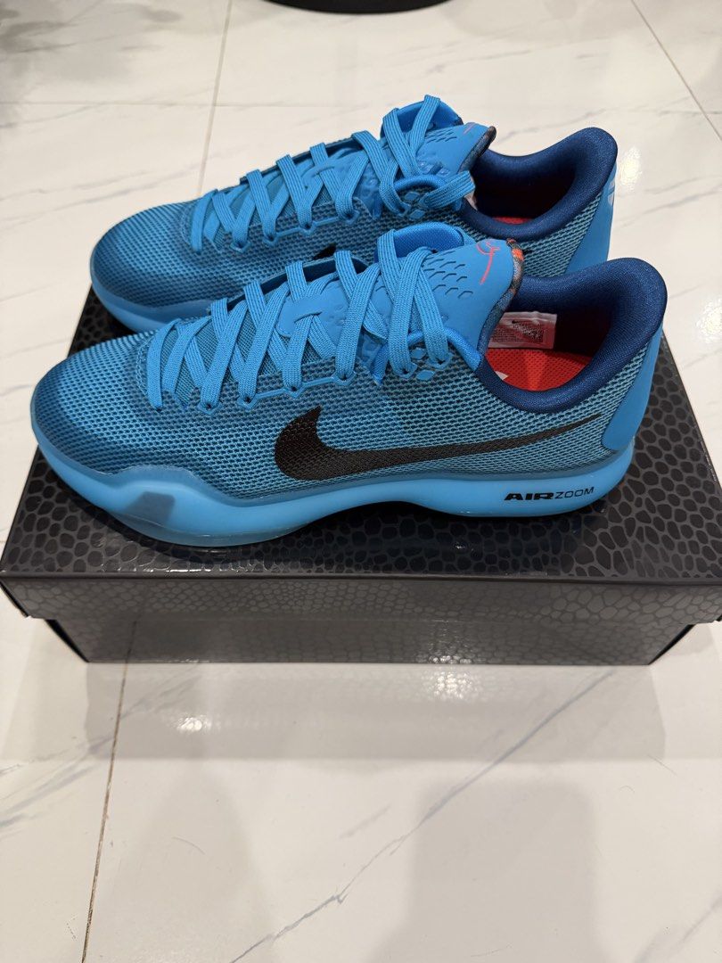 Nike Kobe X Blue Lagoon (Category: Sneakers) located in Manila. Submitted by sberja07 (Listing ID 1469423396, Image 2). Description: Size 10 - Model: Nike Kobe X - Colorway: Blue Lagoon - Upper: Vibrant blue mesh with black Swoosh branding - Cushioning: Responsive Air Zoom midsole - Details: Kobe Bryant signature on the tongue and red heel tab accents - Packaging: Includes the original snake-skin patterned box - Condition: Well-maintained and rea