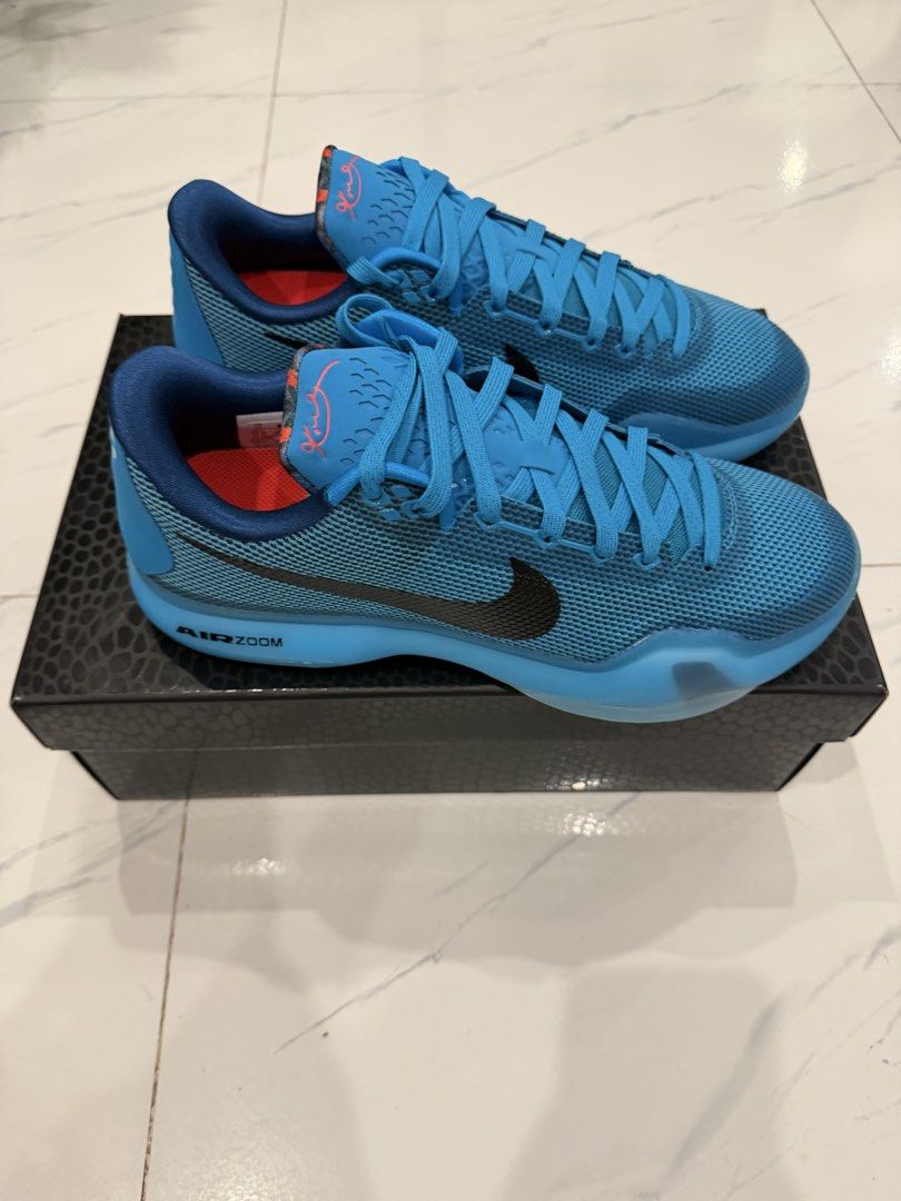 Nike Kobe X Blue Lagoon (Category: Sneakers) located in Manila. Submitted by sberja07 (Listing ID 1469423396, Image 1). Description: Size 10 - Model: Nike Kobe X - Colorway: Blue Lagoon - Upper: Vibrant blue mesh with black Swoosh branding - Cushioning: Responsive Air Zoom midsole - Details: Kobe Bryant signature on the tongue and red heel tab accents - Packaging: Includes the original snake-skin patterned box - Condition: Well-maintained and rea