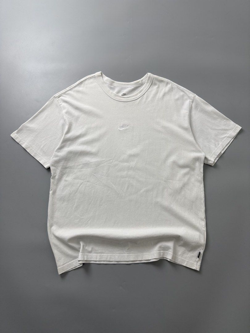 Nike mid logo (Category: Tshirts & Polo Shirts ) located in Pila. Submitted by villanueva80826 (Listing ID 1469523192, Image 1). Description: Nike mid logo embroid Size:large •Width:22 •Length:29 •Condition:9/10 •Color rate:9/10 Mine:480 +Shipping fee Issue:dot blue stain due to tina washable Still in good condition Still wearable .