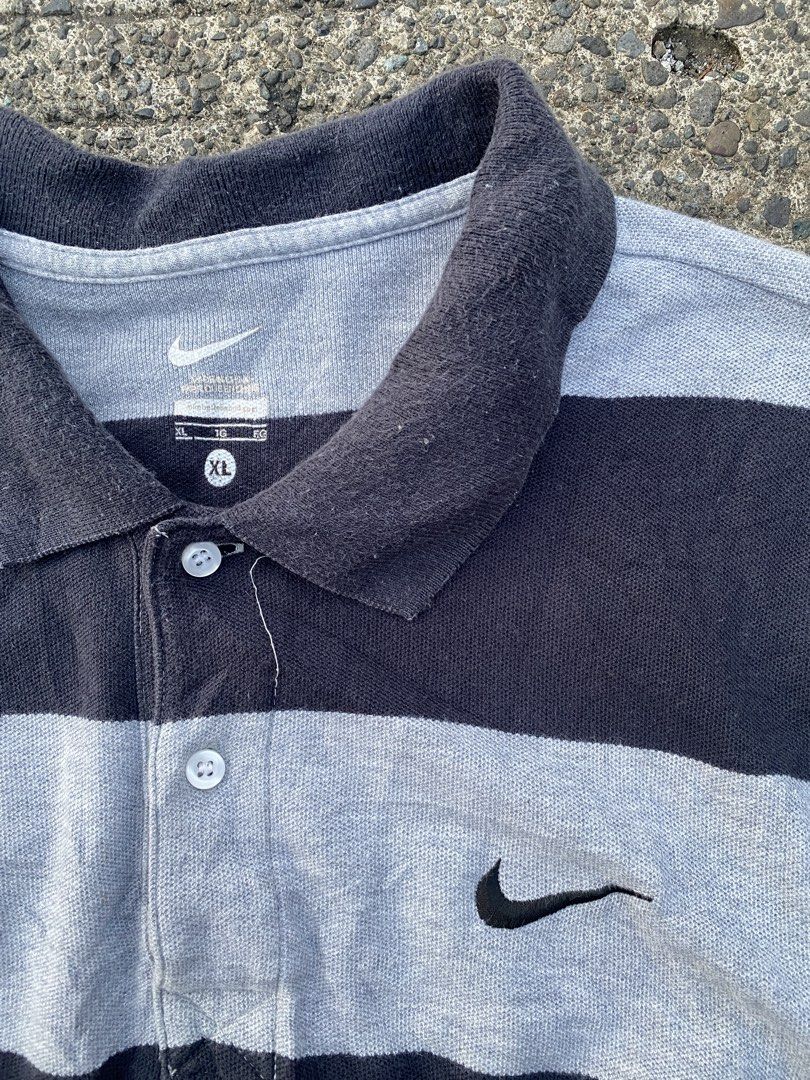 NIKE POLO SHIRT (Category: Tshirts & Polo Shirts ) located in Baguio. Submitted by reniel_thrift (Listing ID 1469512401, Image 2). Description: forsale Nike men’s short-sleeve striped polo shirt •Excellent Condition •Color Rate: 9.5/10 •Issue: None -Size XLarge On tag -Width 19 -Length 28 ₱480ship 📍Baguio City🌲.