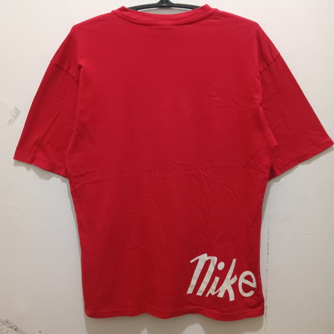 NIKE Red Shirt (Category: Tshirts & Polo Shirts ) located in Caloocan City. Submitted by jaychingsss (Listing ID 1469497153, Image 2). Description: Nike Shirt - 100 20x28 Color Rate: 9.5/10 With Necktag, Cut Washtag NEED WASH.