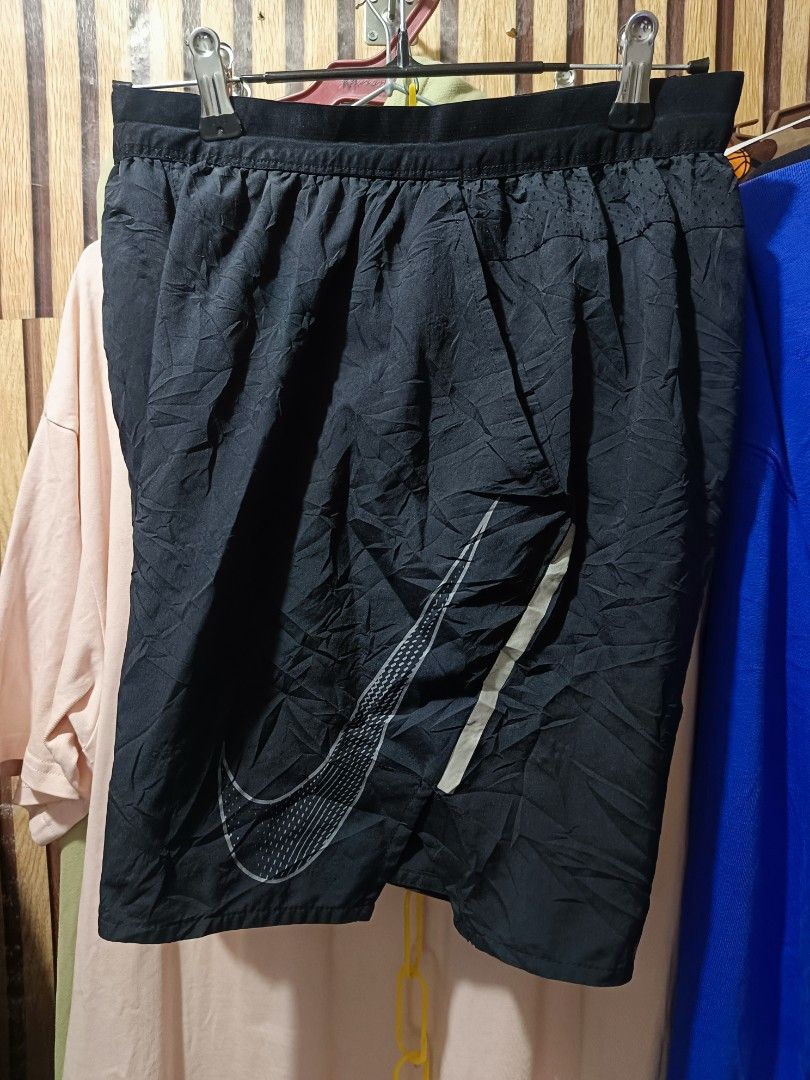 Nike running shorts (Category: Shorts) located in Cebu City. Submitted by iamnegotiable (Listing ID 1469561860, Image 1). Description: Nike dri-fit short Nike dri-fit running short dimes waistline 26-29 inch length 17 inch hem 11 inch no issue available accepting offers.
