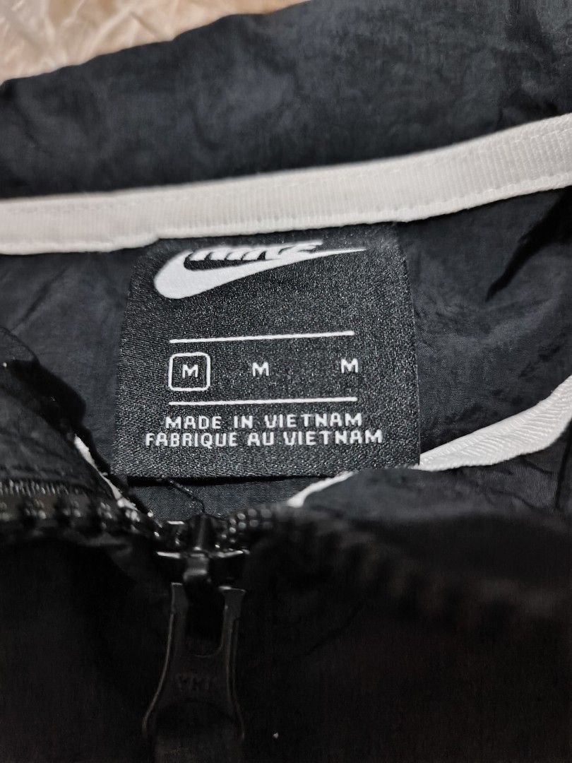 Nike Tie-Dye Swoosh Full-Zip Windbreaker Jacket (Category: Coats, Jackets and Outerwear) located in Quezon City. Submitted by hghthrft (Listing ID 1469487854, Image 3). Description: - Brand: Nike - Style: Tie-dye windbreaker jacket (CI9598-010) - Color: Black, white, and multicolored - Size: Medium - Design: Giant swoosh graphic across chest and back - Features: Full-zip front, stand-up collar, elastic cuffs and hem - Origin: Made in Vietnam.