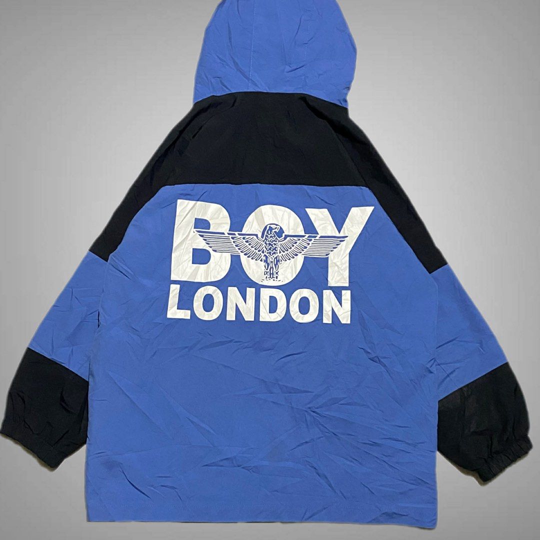 Nike Track Jacket x Boy London WB ASPACK (Category: Coats, Jackets and Outerwear) located in Mabalacat. Submitted by stellargarments (Listing ID 1469433632, Image 3). Description: boy london blue windbreaker Length : 27 Width : 22 Fabric Condition : 9/10 BUONG BUO LOGOS!!! SMOOTH WORKING ZIPPER WITH 2 POCKETS MASIKIP PA RIBBINGS SUPER NICE & KINIS! VERY COMFY & SMOOTH ON SKIN WALANG BUTAS OR GASGAS NEED WASH DEEP WASH FRESH FROM BALE Nike Track J