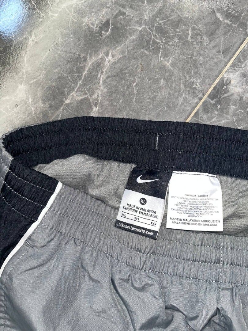 Nike track pants (Category: Jeans) located in Cabagan. Submitted by ronesmabe (Listing ID 1469496092, Image 2). Description: xl on tag 26-33 41 l 10 leghole no issue or as new condi.
