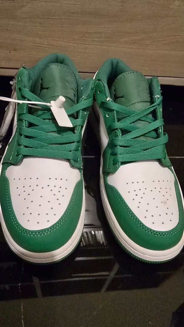 Nike US size 11 men (Category: Sneakers) located in Quezon City. Submitted by ShoesManila (Listing ID 1469537521, Image 3). Description: Nike Size 11 men - Model: Air Jordan 1 Low - Colorway: Green and White - Condition: Clean, fresh soles with great traction, ready to wear - Details: Iconic side swoosh, Jumpman tongue logo, embroidered heel wings logo - Authenticity: Comes with verification tag attached Location: Diliman, QC No COD.