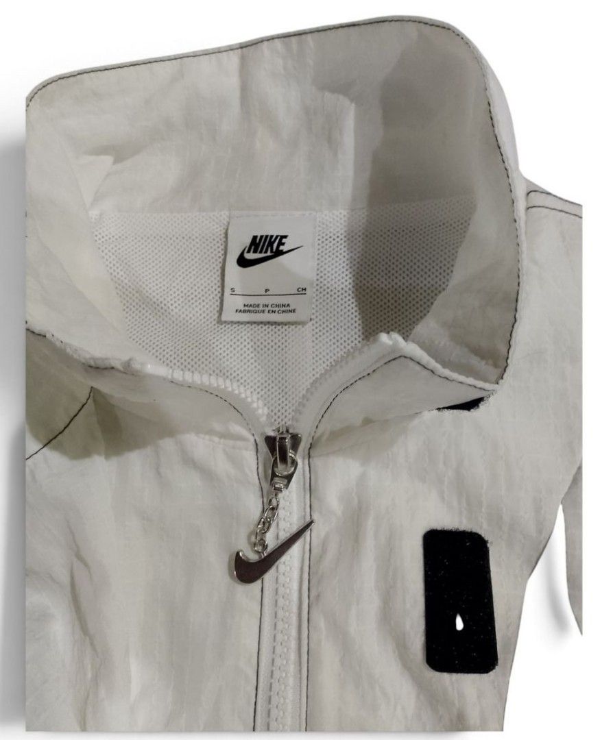NIKE WOVEN JACKET FOR WOMENS (Category: Coats, Jackets and Outerwear) located in Bacolod City. Submitted by rodzthrift (Listing ID 1469500871, Image 3). Description: NIKE WOVEN WINDBREAKER DOUBLE SWOOSH AUTHENTIC ORIG SMALL-MEDIUM 23 Length 25 Width GOOD AS NEW FLAWLESS ADJUSTABLE 899 FREESHIPPING THRU JNT SHIPPING CAN DO TRANSFER FACEBOOK TO PROVE AS A LEGIT SELLER.