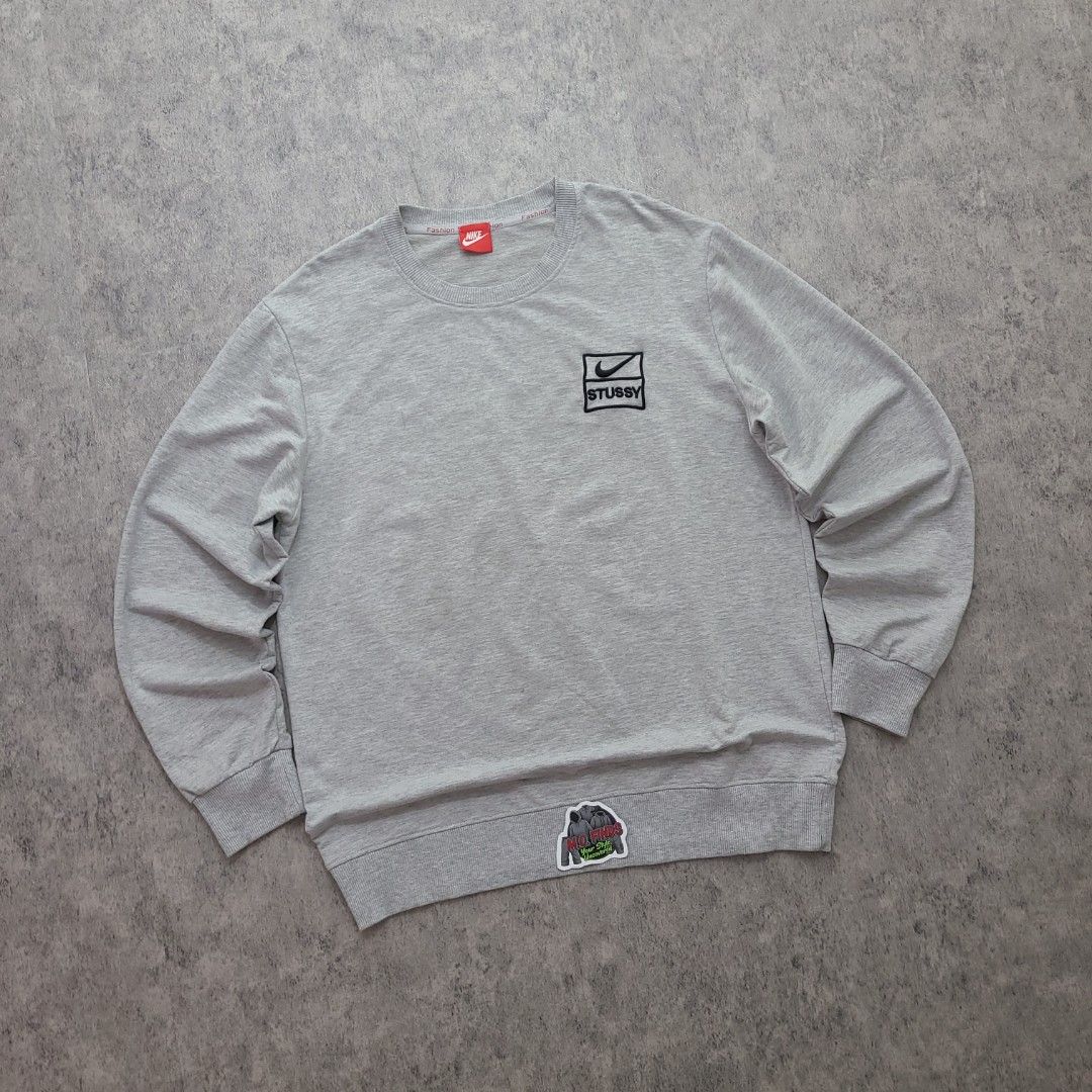 Nike x Stussy Grey Sweatshirt (Category: Coats, Jackets and Outerwear) located in Quezon City. Submitted by mofinds.ph (Listing ID 1469430207, Image 1). Description: Size: Large to XL Dimes: 23x28 Condition: Excellent/Great condition MOP: BPI DELIVER: LALAMOVE OR J&T MEETUP/PICKUP: Victoria Tower D, Mother Ignacia Ave., Brgy. Paligsahan, Diliman, Quezon City.