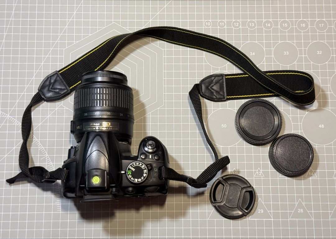 Nikon D3100 DSLR Camera with Kitlens (Category: Cameras) located in Mandaluyong City. Submitted by benjperez (Listing ID 1469517293, Image 1). Description: Nikon D3100 DSLR with 18-55mm Kitlens Condition: (First Owner) Signs of Usage sa body and lens Intact Rubber Covers Crispy Buttons and Dials Has fungus sa kitlens (bili na lang kayo bago or palinis) Has Vignette in LCD pero tolerable (see pics) Short Specs: - Sensor: 14.2 effective megapixels,
