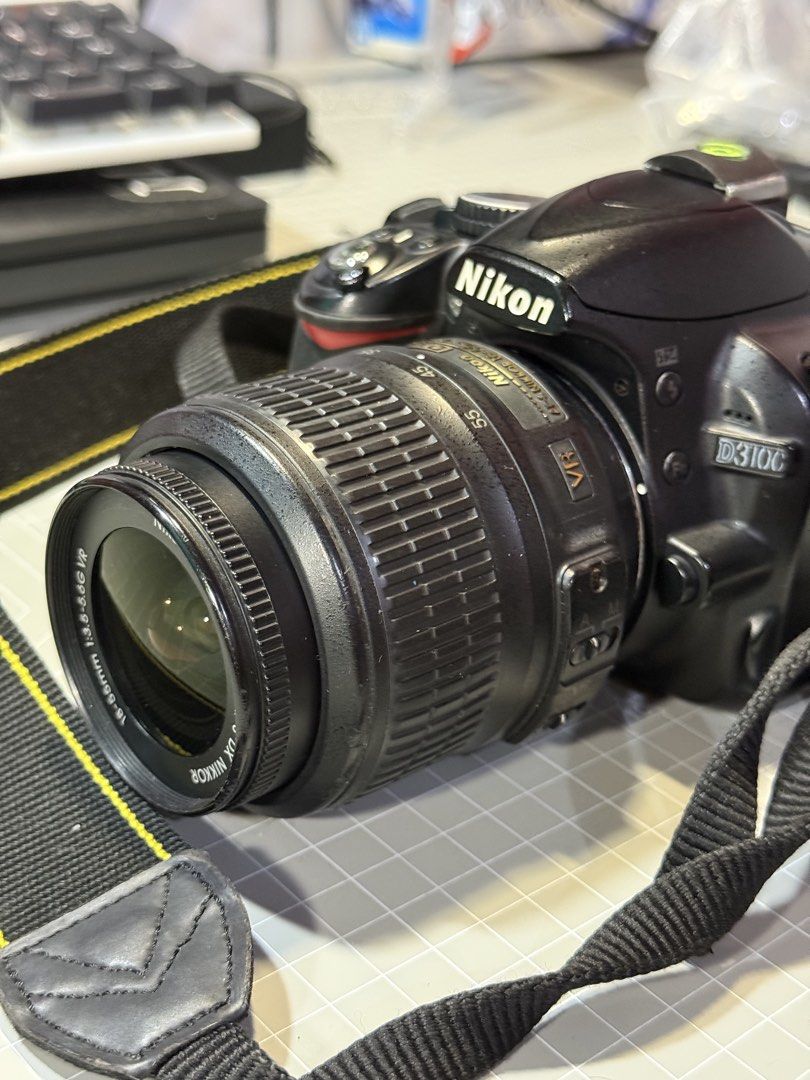 Nikon D3100 DSLR Camera with Kitlens (Category: Cameras) located in Mandaluyong City. Submitted by benjperez (Listing ID 1469517293, Image 3). Description: Nikon D3100 DSLR with 18-55mm Kitlens Condition: (First Owner) Signs of Usage sa body and lens Intact Rubber Covers Crispy Buttons and Dials Has fungus sa kitlens (bili na lang kayo bago or palinis) Has Vignette in LCD pero tolerable (see pics) Short Specs: - Sensor: 14.2 effective megapixels,