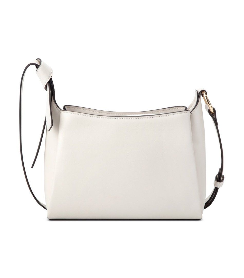 Nine West Lyra Crossbody Bag (Category: Cross-body Bags) located in Manila. Submitted by evavelasquez (Listing ID 1469538257, Image 2). Description: Brand New, padala ng tita ko sakin kaso madami nako bags. Pm me I will send the actual picture.