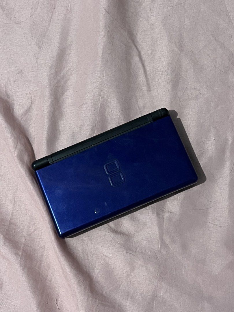 Nintendo Ds Lite (Category: Nintendo) located in Manila. Submitted by milamartina123 (Listing ID 1469531374, Image 1). Description: unit, batt and cartridge cover only issue seen in photos but still touchable the screen and working buttons tondo, manila loc can meet up nearby no return/refund once settled .