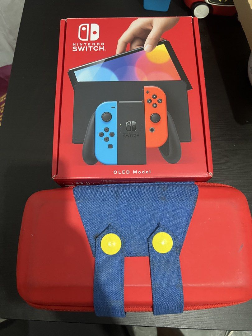 Nintendo Switch OLED 128gb jailbreak complete (Category: Nintendo) located in Makati City. Submitted by christian.19 (Listing ID 1469397407, Image 1). Description: Nintendo switch oled Permanent dato jailbreak 128gb sd card Loaded with games No issue Pede request games na gusto mo bago meet up Complete with box Dock and orig charger 128gb sd card brandnew lenovo Free mario hardcase Price 12500 nego pa konti sa surebuyer Pm lang.