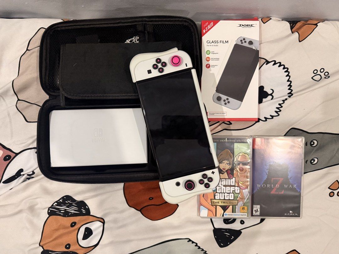 Nintendo Switch Oled (Category: Nintendo) located in Pasig City. Submitted by sellszz001 (Listing ID 1469536244, Image 1). Description: 🎮 FOR SALE: NINTENDO SWITCH OLED WHITE 💰 Selling Price: ₱13,000 INCLUSIONS: ✅ Nintendo Switch OLED White ✅ Complete box and receipt ✅ Complete original accessories ✅ Hard carrying case bag ✅ 256GB SD Card ✅ 2 Physical Games: 🎮 GTA Trilogy 🎮 World War Z (WWZ) Pwedeng trade sa PS5 nyo add ako cash offer lang ka